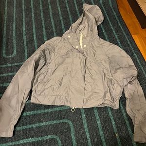 Tablet is crop top wind breaker.